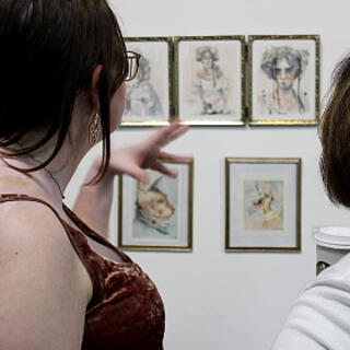 With paintings on display